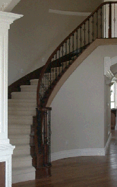 Cherry Staircase with Single and Double Basket Iron Balusters